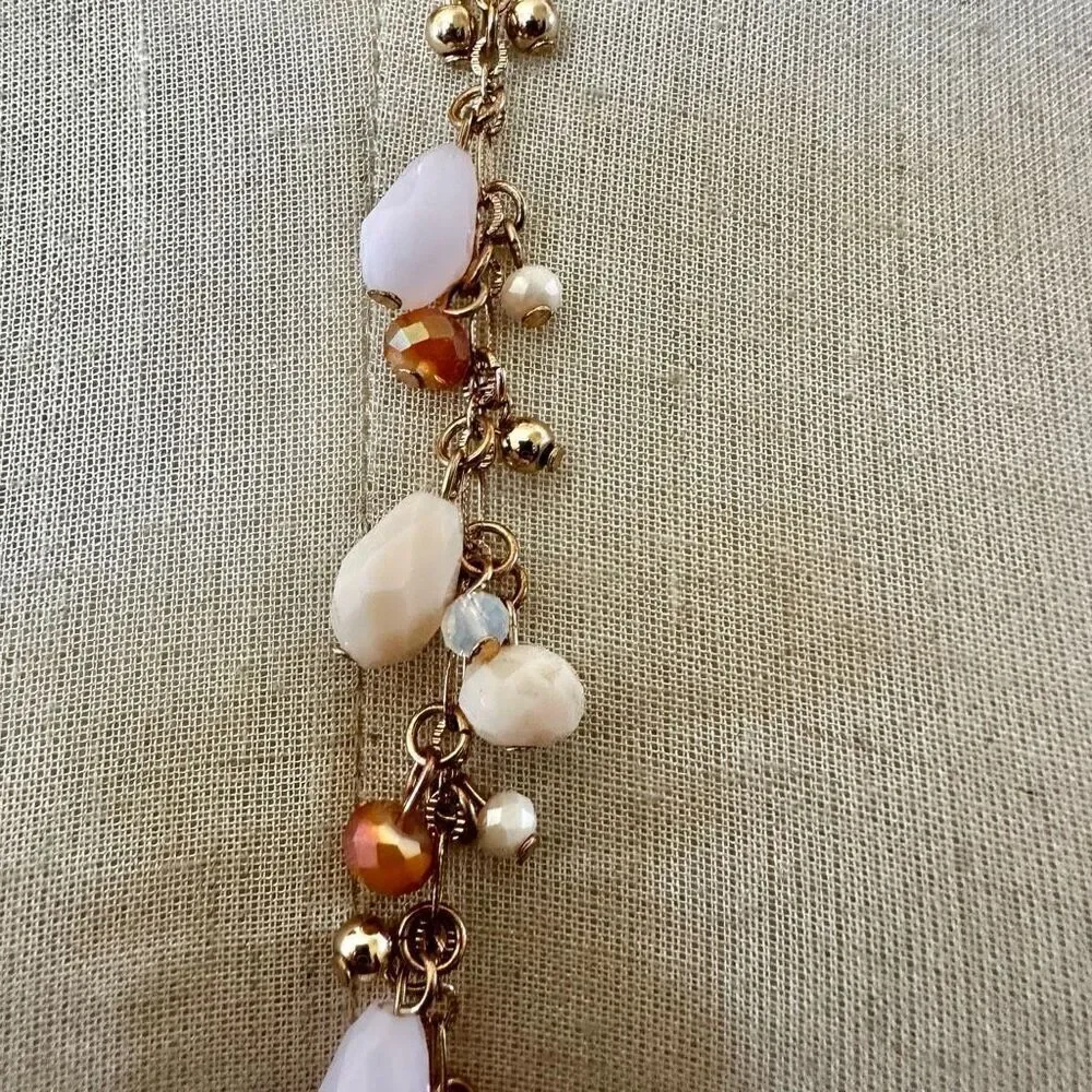 AA  gold tone long beaded Y necklace